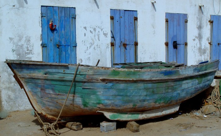 wooden boat at land